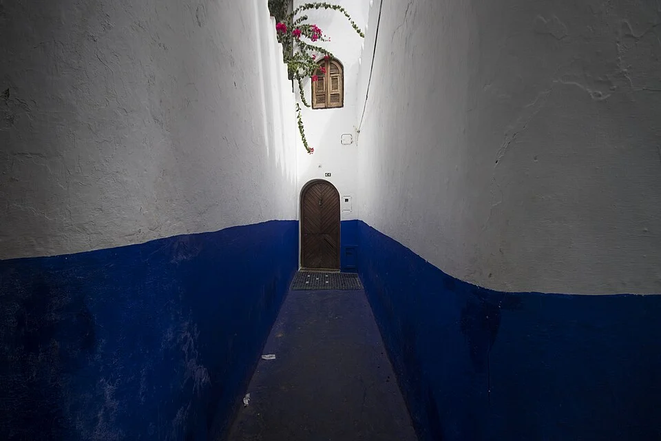 A blue alley in Chefchaouen, where we scout color palettes