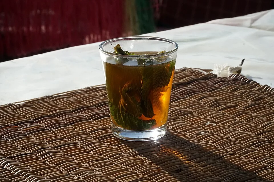 Mint tea in a Marrakech shop, the correct setting for any serious rug conversation